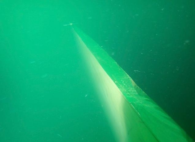 Repaired propeller blade edge seen underwater