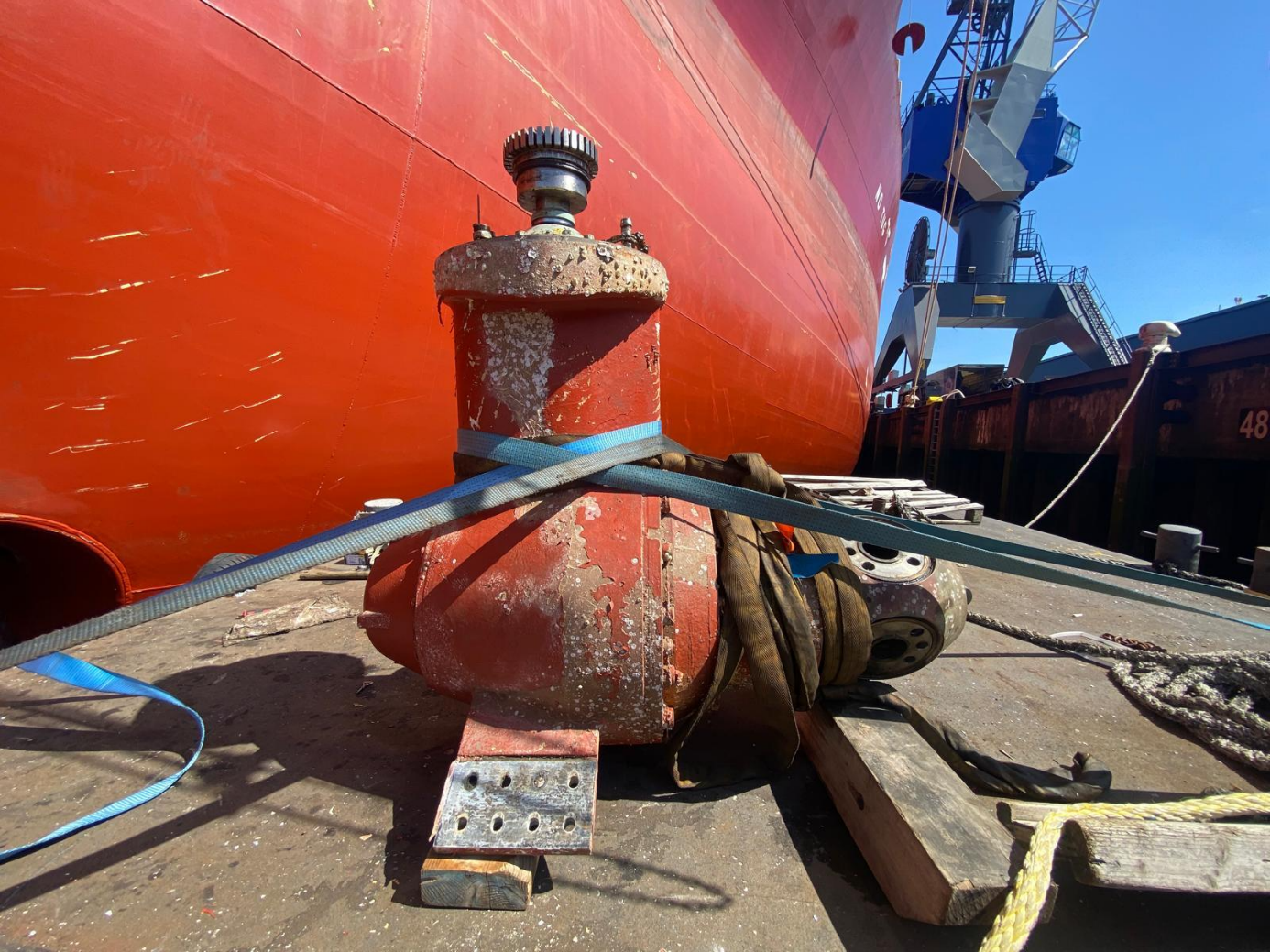 Thruster unit removed from a vessel and secured on the quay beside the ship