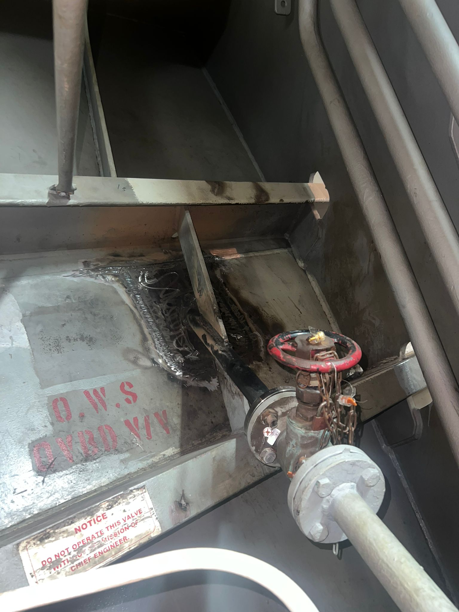 Welded steel repair inside a vessel next to the oily water separator overboard valve