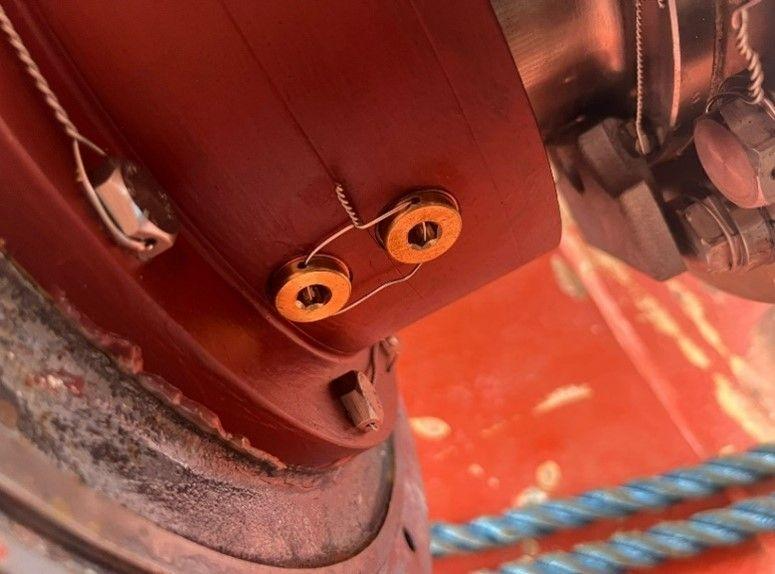 Blade bolt keepers secured with locking wire on a propeller hub